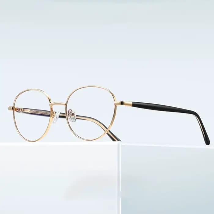 Monture de lunettes ronde en métal tendance pour femmes