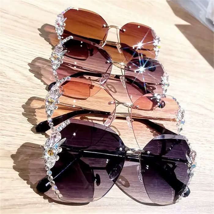 Lunettes de soleil sans monture avec strass
