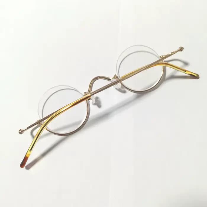 Monture de lunettes demi-cercle dorée en métal