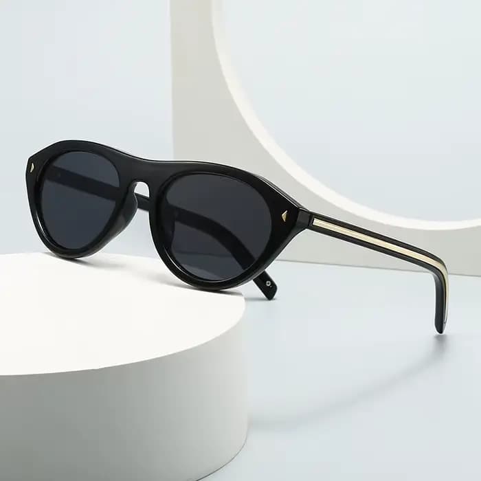 Lunettes de soleil triangulaires rétro modernes de grand nom européen et américain pour femmes