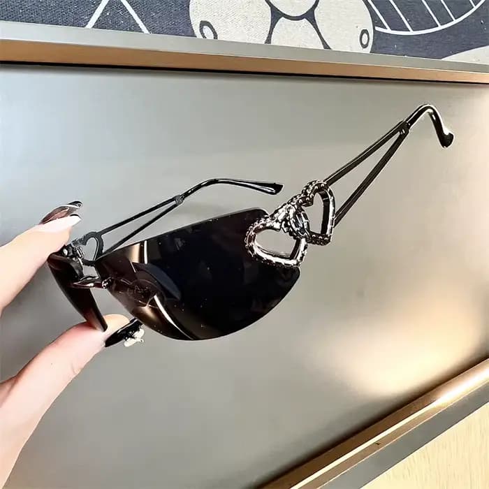 Lunettes de soleil sans monture tendance Y2K pour femmes, design de luxe œil de chat, idéales pour l