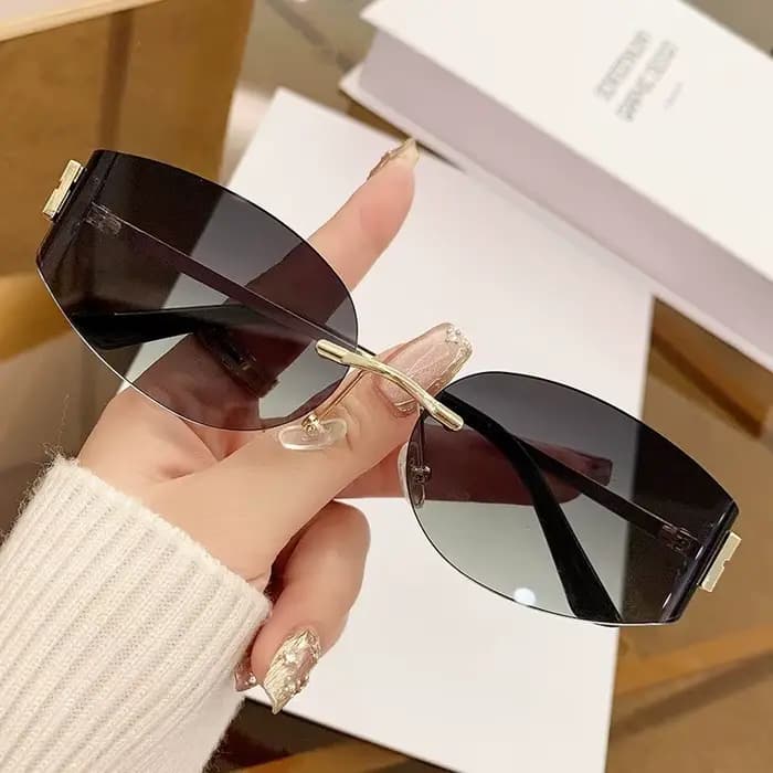 Lunettes de soleil ovales sans bords pour femmes, UV400, verres noirs dégradés surdimensionnés, mont