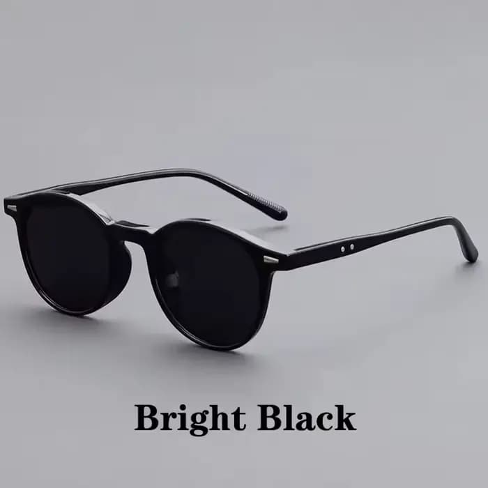 Une paire de lunettes de soleil rétro à monture ronde, personnalisées, simples et élégantes, unisexe