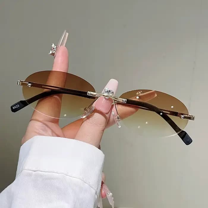 Lunettes de soleil ovales sans monture pour hommes et femmes