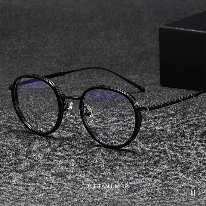 Lunettes de vue rétro rondes en titane et acétate