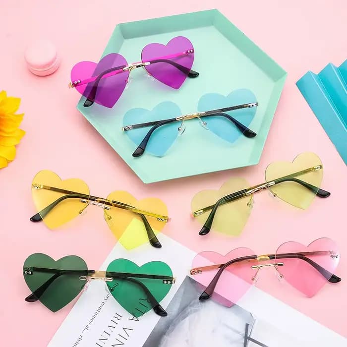 Lunettes de soleil en forme de cœur sans monture pour femmes