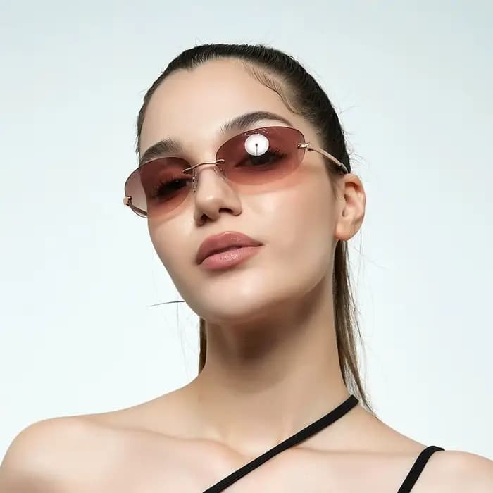 Lunettes de soleil ovales sans monture pour femmes