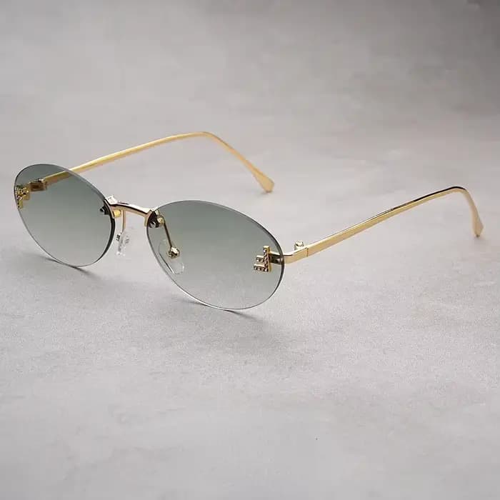Lunettes de soleil ovales sans bords pour femmes