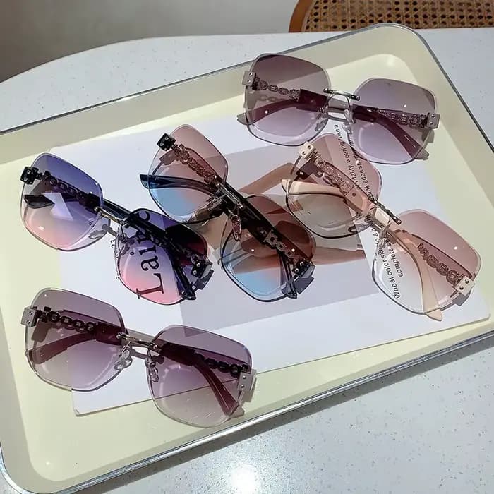 Lunettes de soleil carrées sans monture INS Fashion avec chaîne