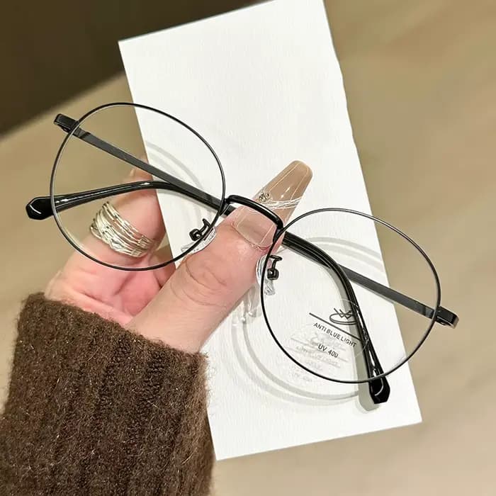 Lunettes à petite monture ovale en fil d'or littéraire