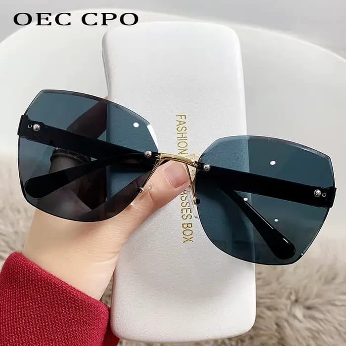 Lunettes de soleil carrées sans monture pour femme