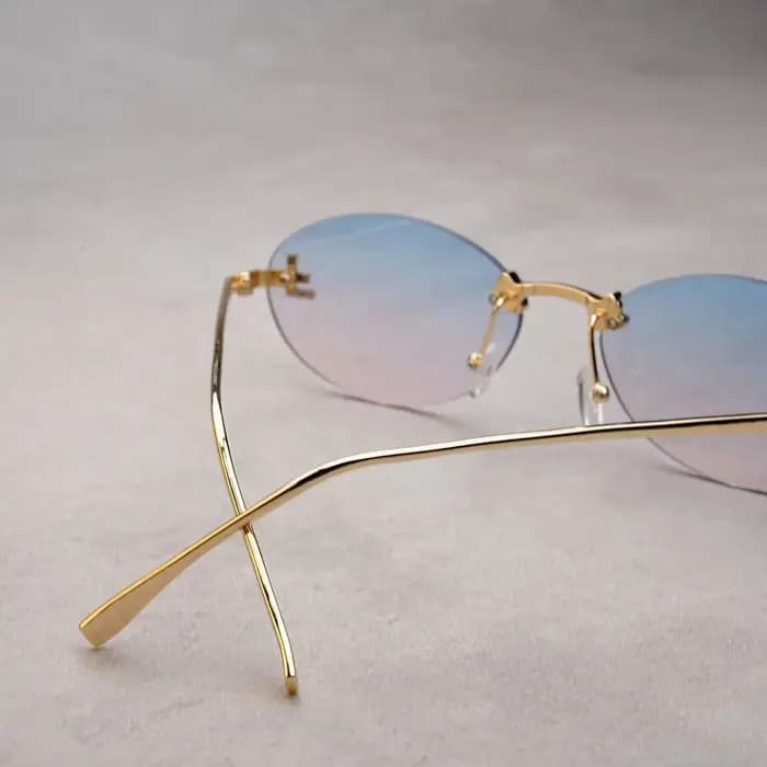 Lunettes de soleil ovales sans bords pour femmes