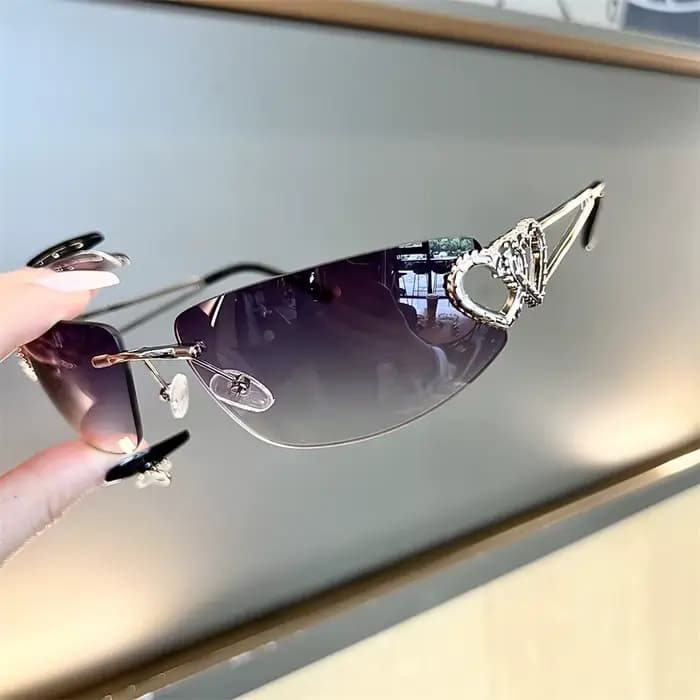 Lunettes de soleil ovales rétro personnalisées sans monture avec découpe en métal en forme de cœur