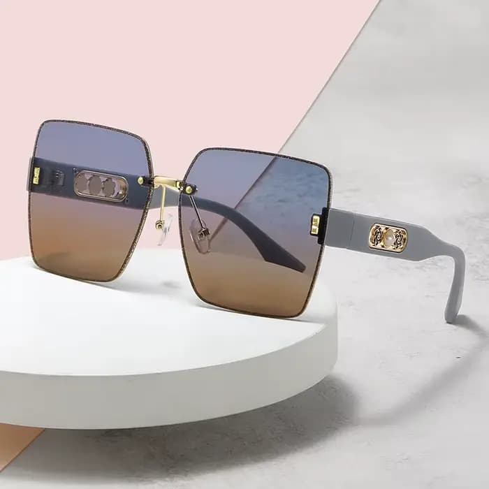 Marque de luxe moderne femmes lunettes de soleil Glamour dames concepteur sans monture