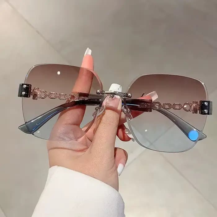 Lunettes de soleil carrées sans monture INS Fashion avec chaîne