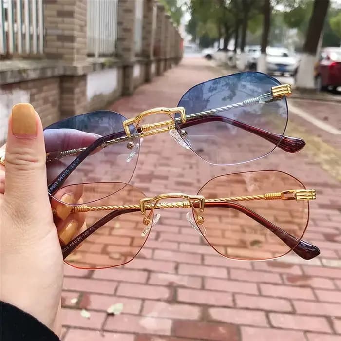 Lunettes de soleil sans cadre en métal doré pour femmes
