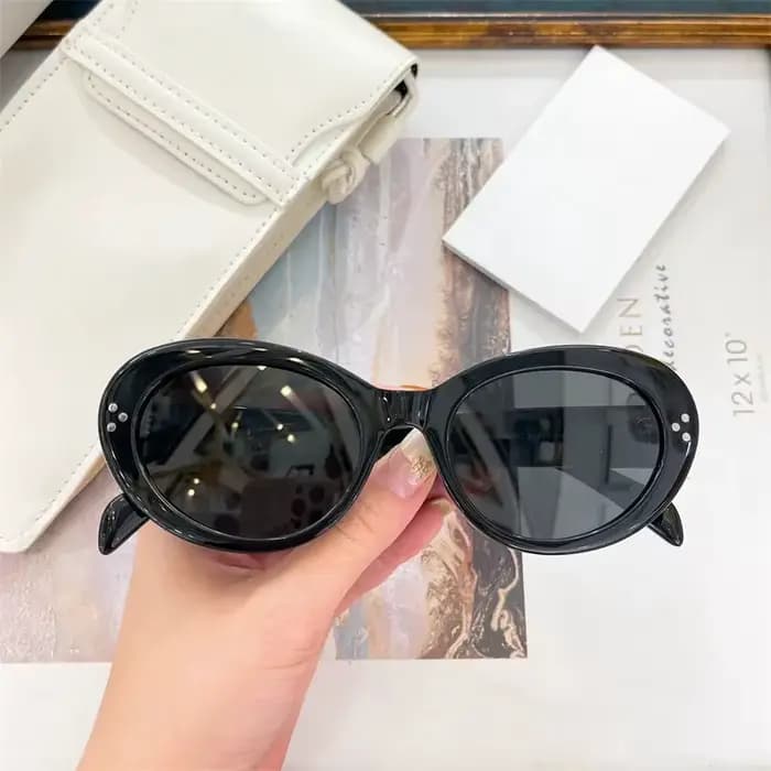 Lunettes de soleil ovales à la mode pour femmes