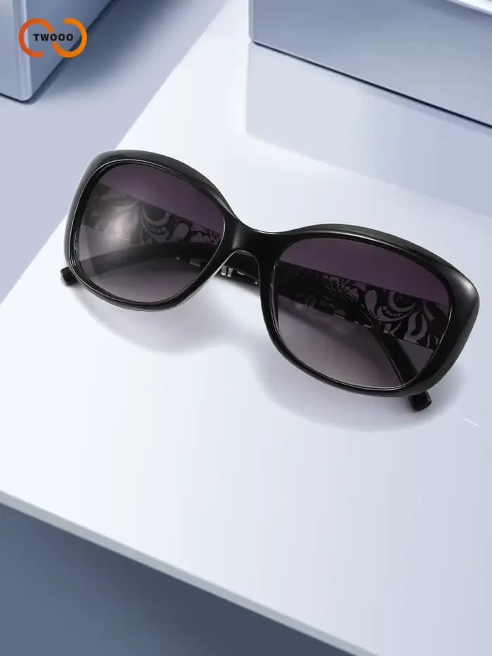 Lunettes de soleil élégantes à grande monture ovale pour femmes avec motif unique