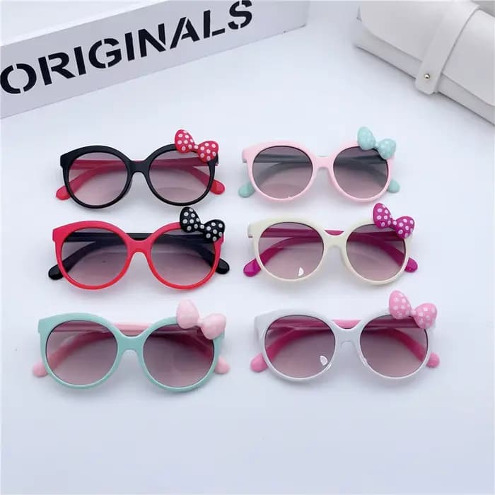 Lunettes de soleil décorées avec nœud en plastique