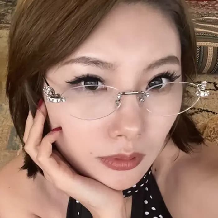 Lunettes de soleil ovales de luxe exquises sans monture
