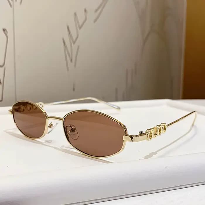 Lunettes de soleil de luxe en métal avec lettres
