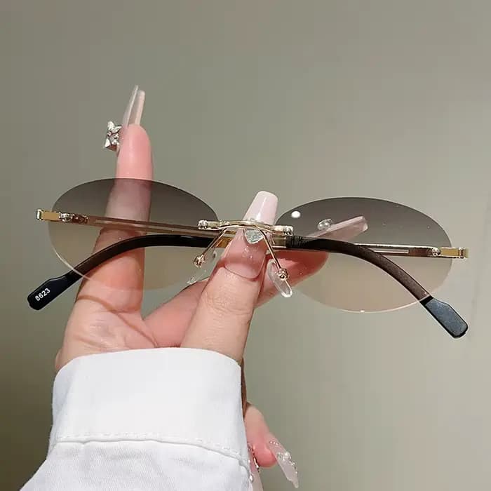 Lunettes de soleil ovales sans monture pour hommes et femmes