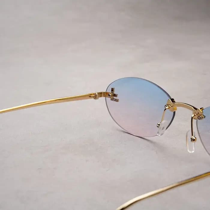 Lunettes de soleil ovales sans bords pour femmes