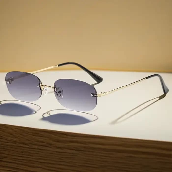 Lunettes elliptiques Anti-lumière en métal sans cadre pour femmes
