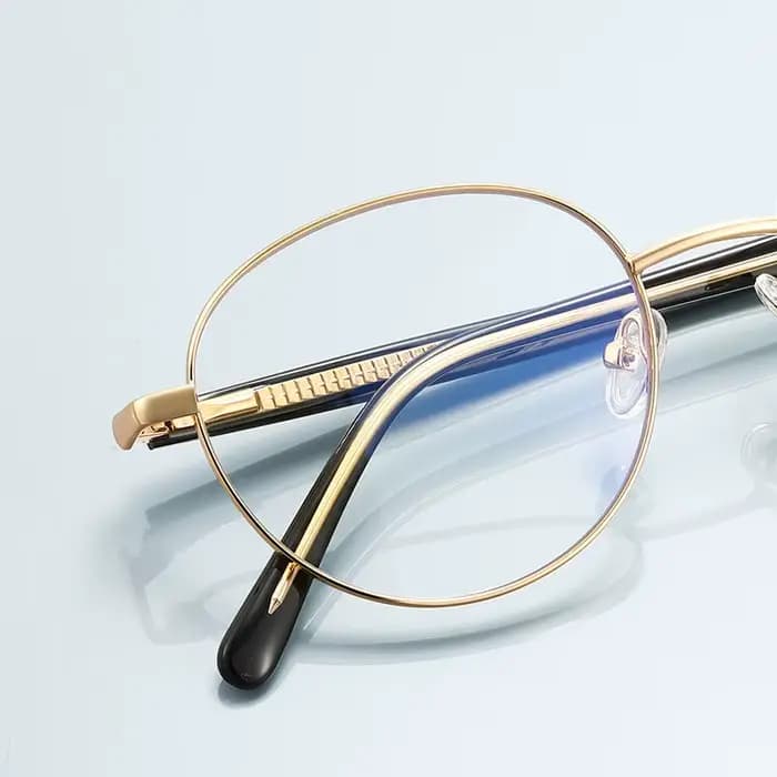 Monture de lunettes ronde en métal tendance pour femmes