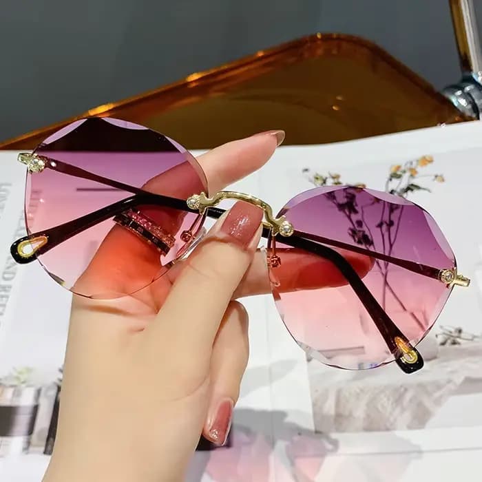 Lunettes de soleil rondes sans monture classiques pour femmes