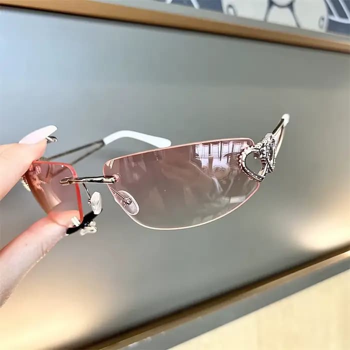 Lunettes de soleil ovales rétro personnalisées sans monture avec découpe en métal en forme de cœur
