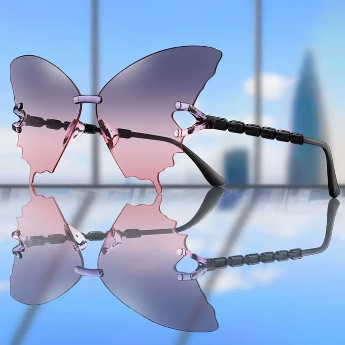 Lunettes de soleil papillon tendance pour femmes et hommes – Monture irrégulière mignonne et décontractée pour le