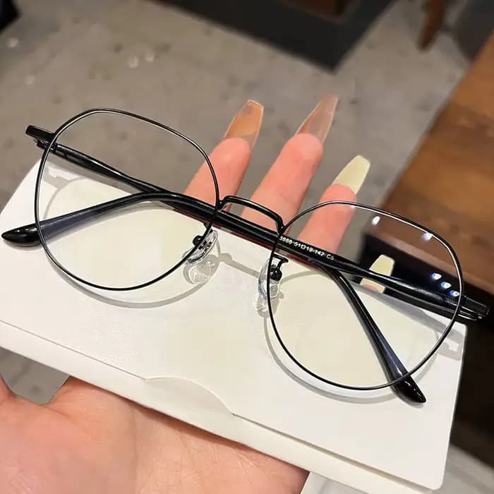 Lunettes claires femmes polygonales monture métallique