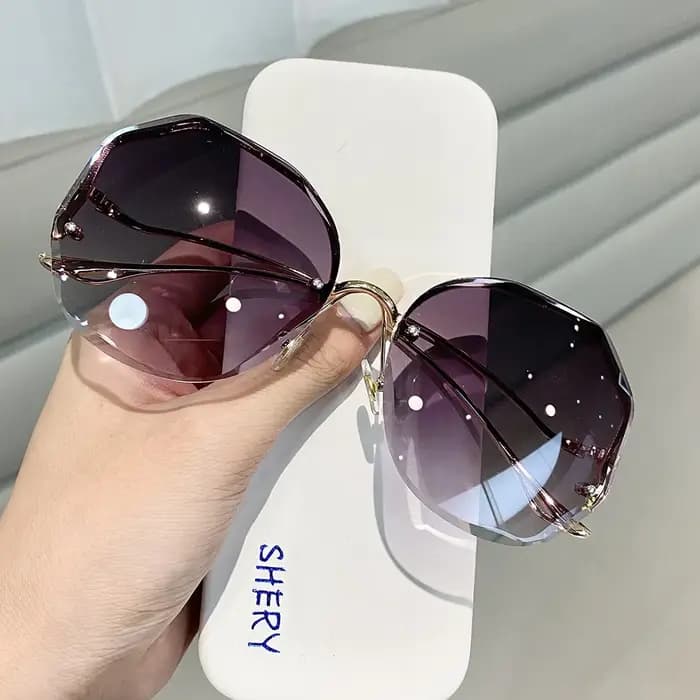 Lunettes de soleil rondes sans monture pour femmes
