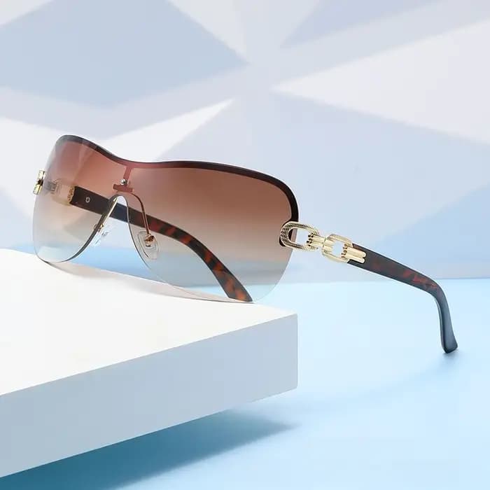 Lunettes de soleil une pièce à la mode pour femmes et hommes