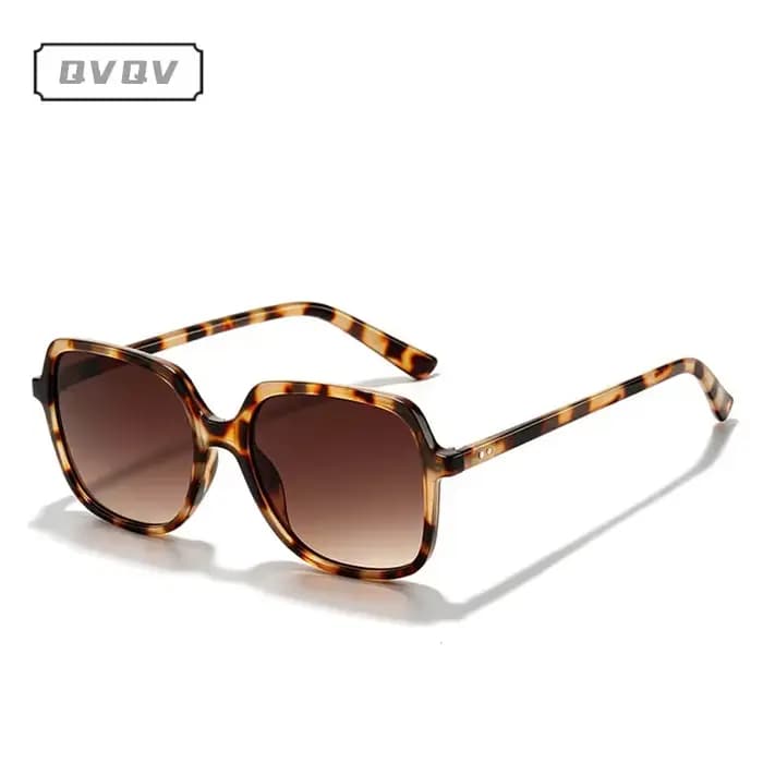 Lunettes de soleil carrées rétro à monture ambrée rivetée pour femme