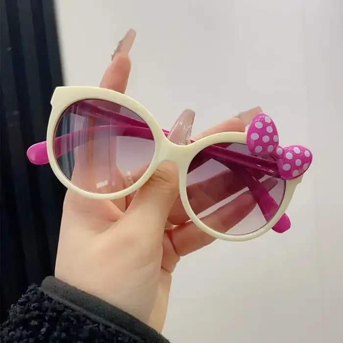 Lunettes de soleil décorées avec nœud en plastique
