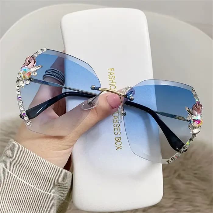 Lunettes de soleil sans monture avec strass