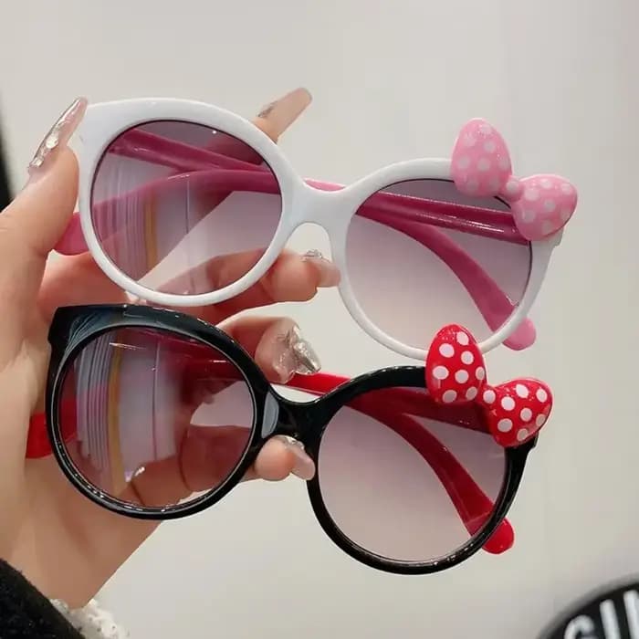 Lunettes de soleil décorées avec nœud en plastique