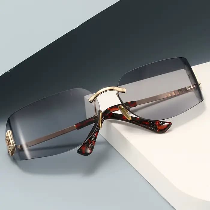 Lunettes de soleil haut de gamme pour femmes, sans cadre, incurvées, intégrées, pour la Protection d