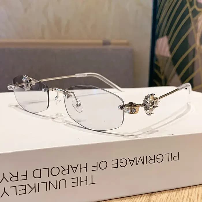 Lunettes de soleil ovales de luxe exquises sans monture