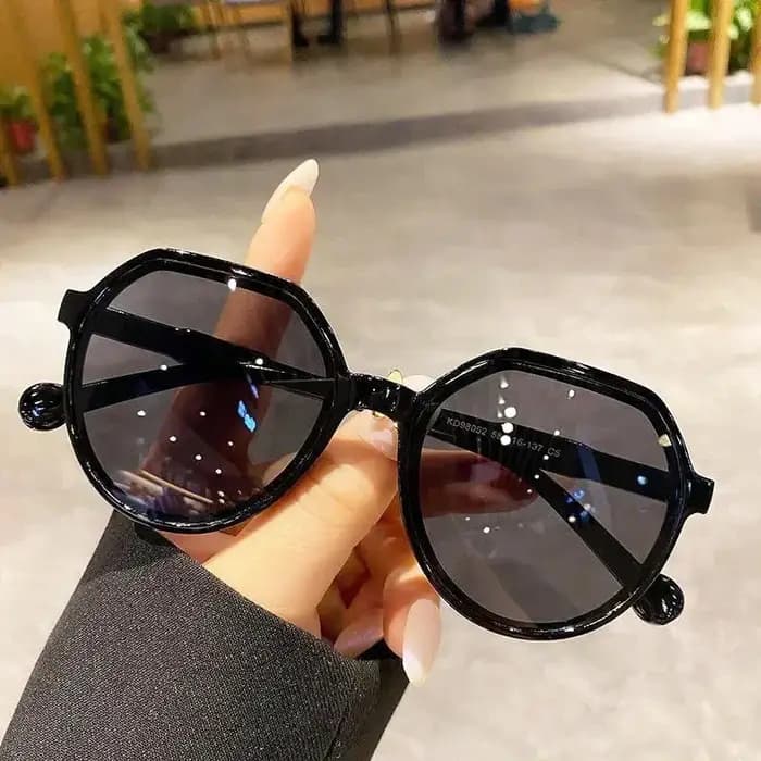 Lunettes de soleil rondes authentiques à monture épaisse