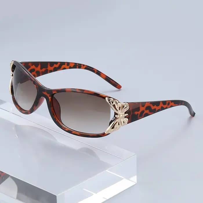 Lunettes de soleil pour femmes avec cadre décoré de papillons
